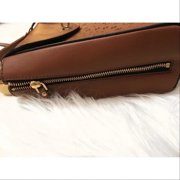 BCBGMaxAzria laser cut trapeze handbag
